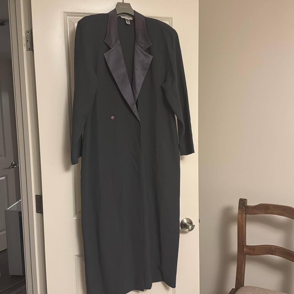 Wow!  Unlined 100% wool crepe coat/dress. Size 12 in excellent condition.